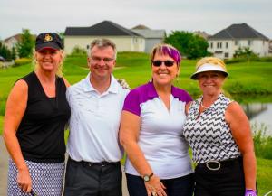 a-goup-of-golfers-posing-for-a-group-shot 14856675643 o