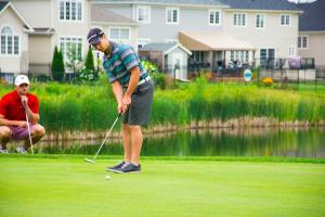 golfer-took-his-putt-and-waiting-to-see-what-happens 14834394174 o
