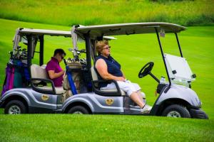 two-golfers-waiting-to-move-on-on-the-golf-course 14649993750 o